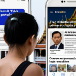 **Image Prompt:** A concerned Thai person looking at a smartphone screen filled with overlapping news headlines about AI data breaches and privacy violations, with a small PDPA (Personal Data Protection Act) logo visible. The background should subtly feature iconic Thai landmarks blurred out, symbolizing the integration of AI into daily Thai life. Focus on conveying a sense of uncertainty and the need for awareness.